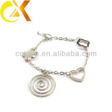 Pulsera de joyería de acero inoxidable con corazón y colgante de flores para niña encantadora